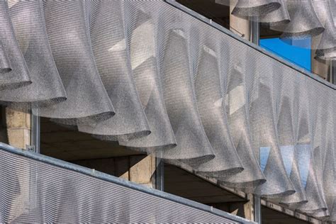 stretched metal fabric facade|fabric for exterior walls.